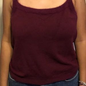 I can’t make out the brand to this shirt